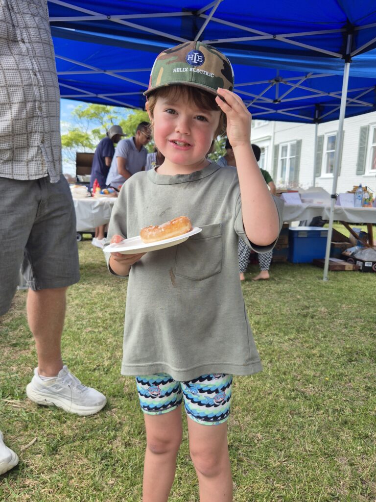 Boy eating donut