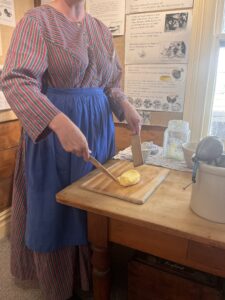 Woman shaping butter