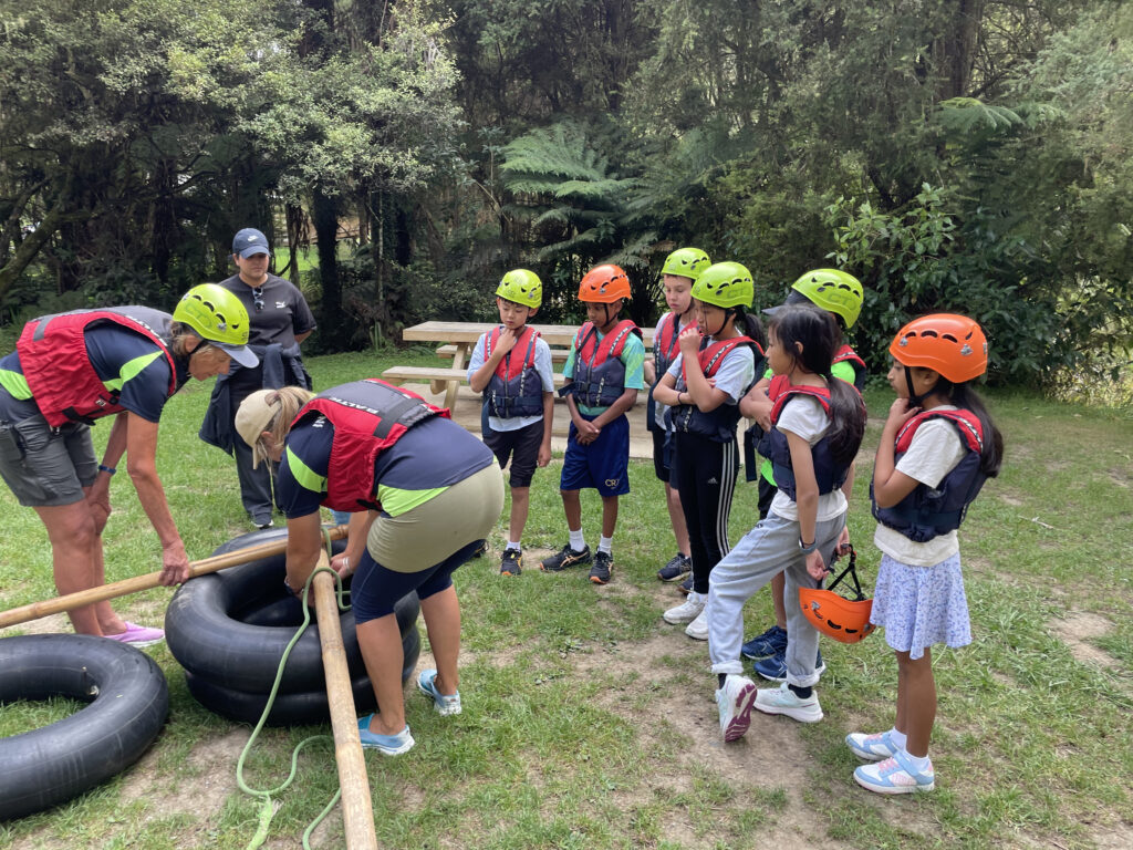 Children wearing climbing hats