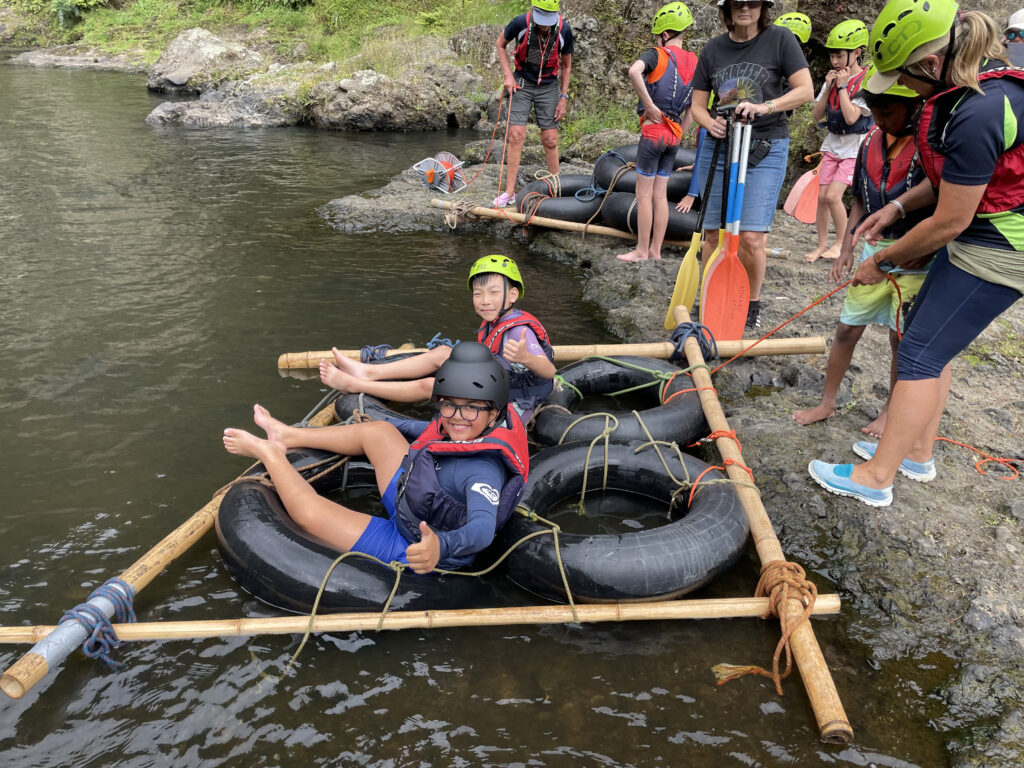 Children floating on tyres