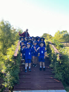 Children walking over bridge