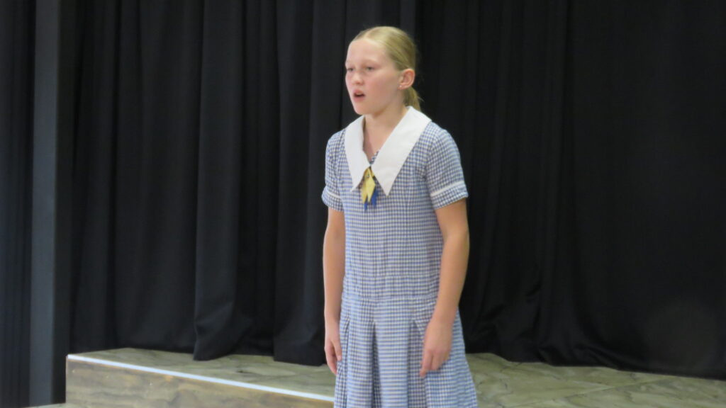 Young girl delivering speech