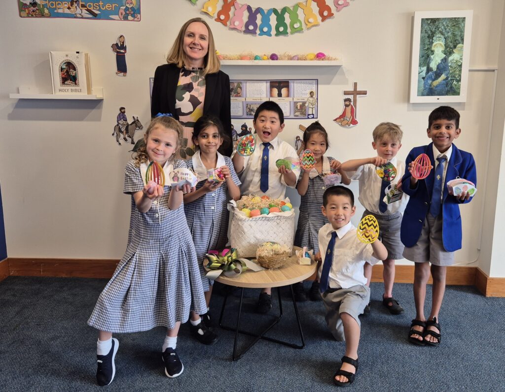 A group of school children with their teacher