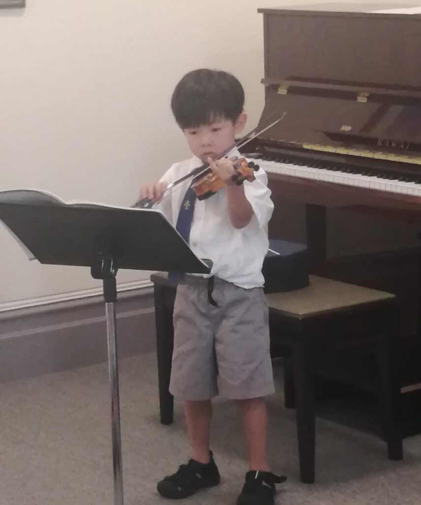 Small boy with violin