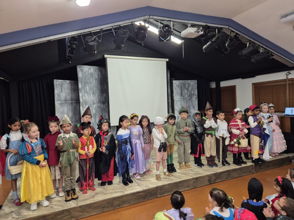Girls and boys dressed in costume