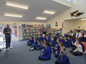Boys and girls listening to presentation