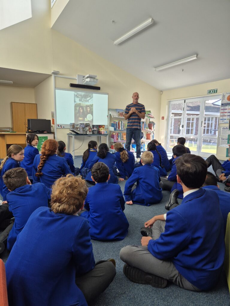 Boys and girls listening to author