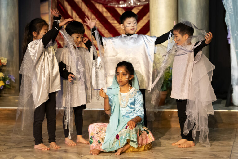 group of children wearing white