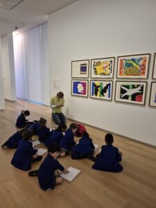 Young children observing art
