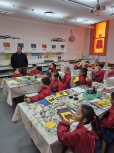 Young student making art