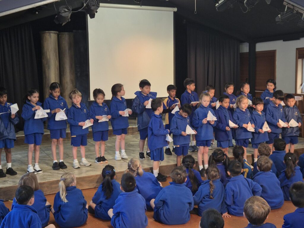 Children standing on stage