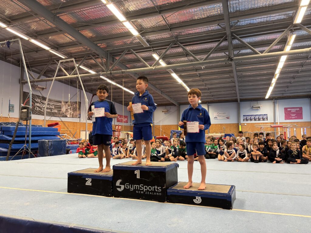 Boys on a sports podium