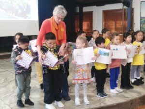 Children share stories at assembly