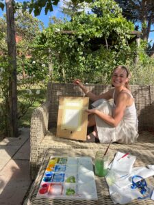 Women painting in garden