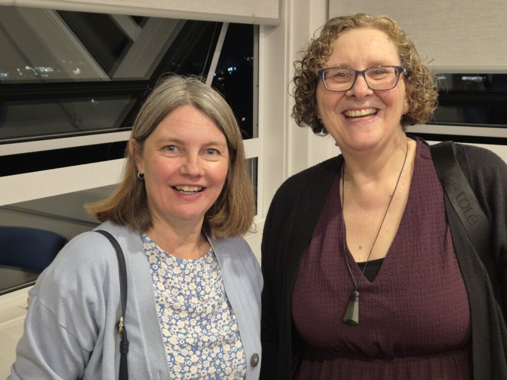 Two people posing for a photograph