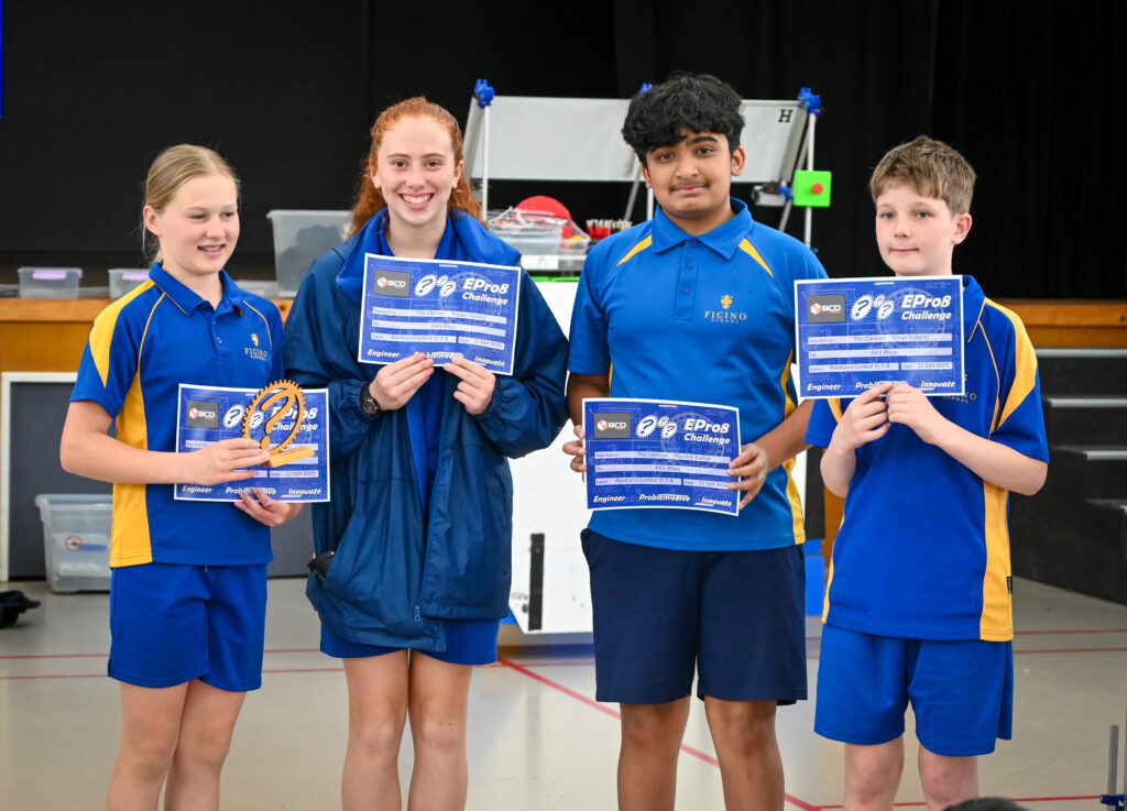 A group of students holding certificates