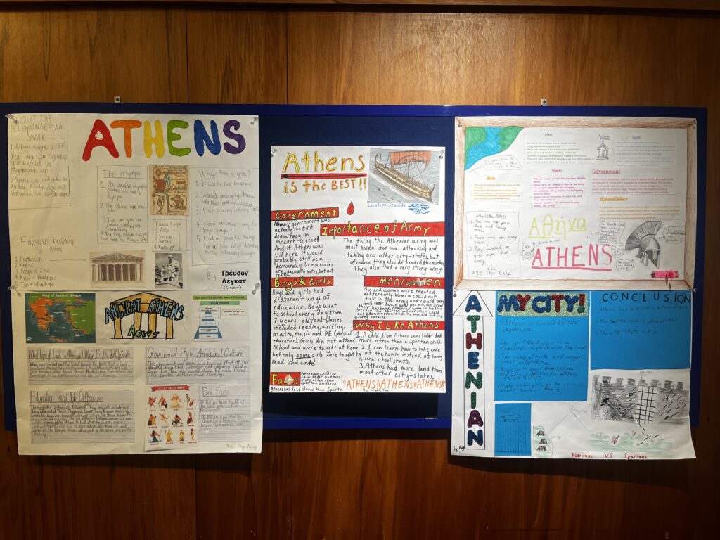 Student school work on a pinboard