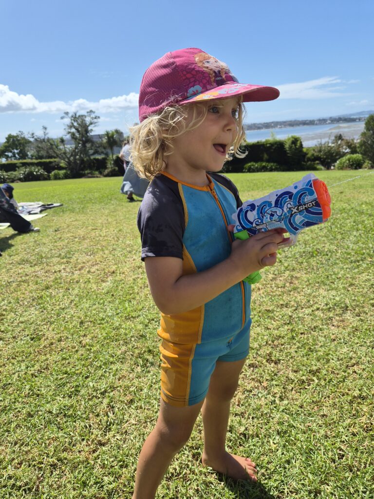 Young child with water pistol