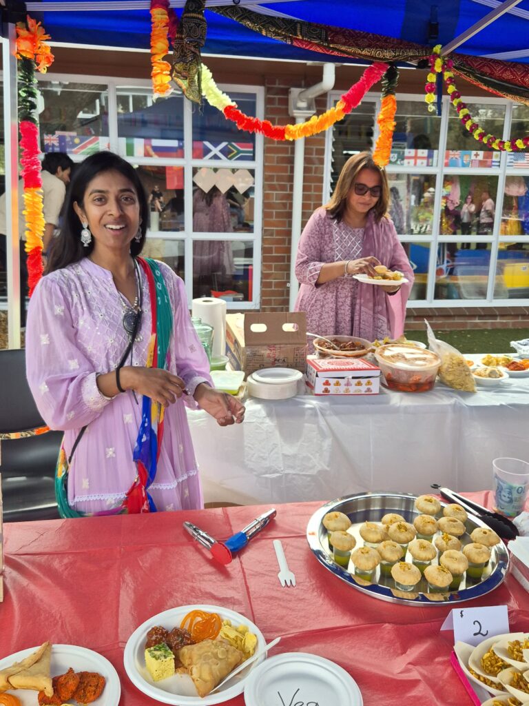 Indian women serving food