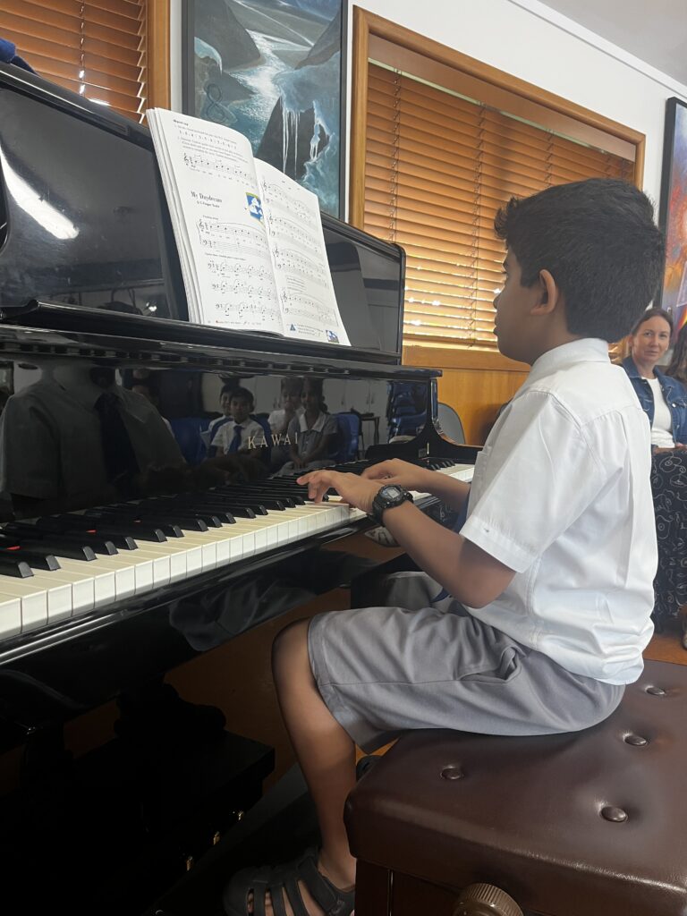 Boy playing piano