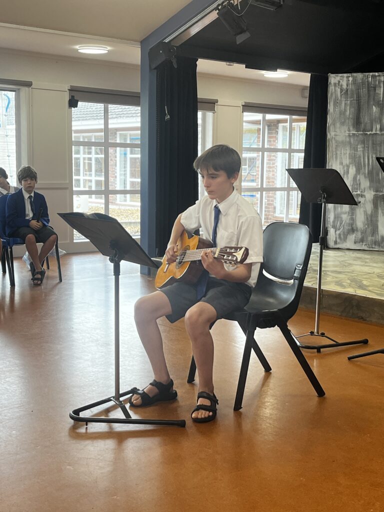 Boy playing guitar