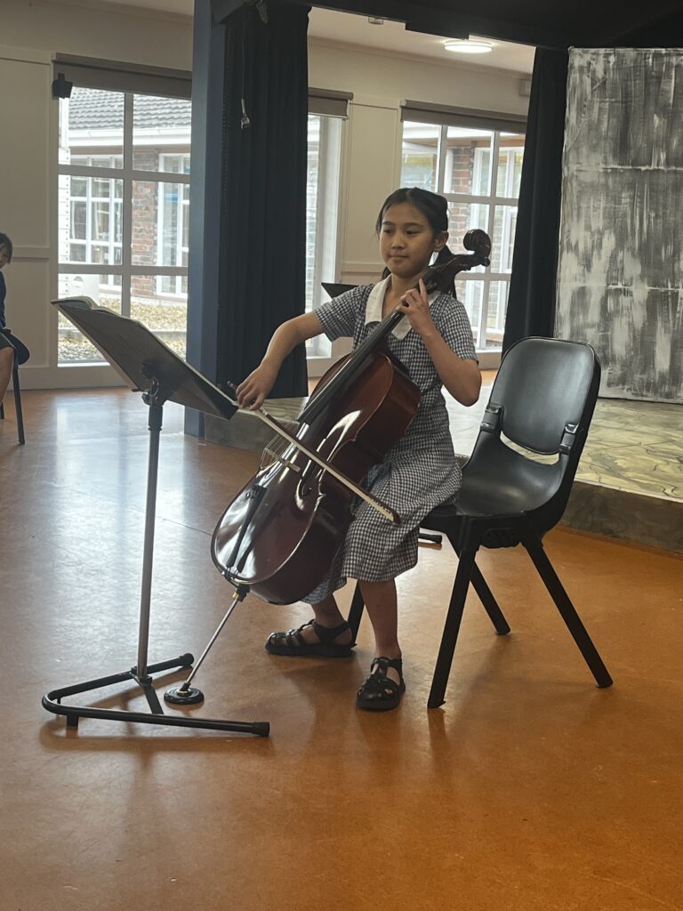 Girls playing the cello