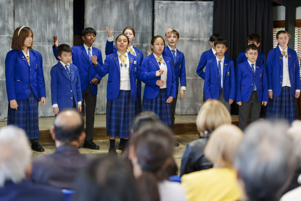 School choir performing on stage