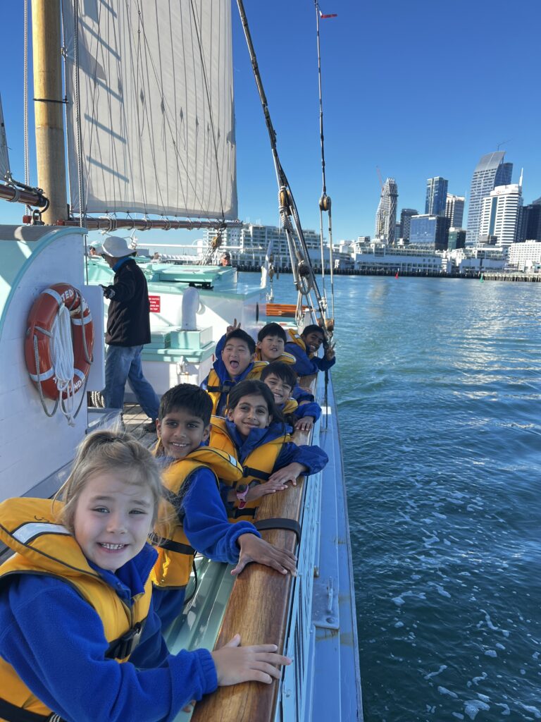 A group of children on a boat