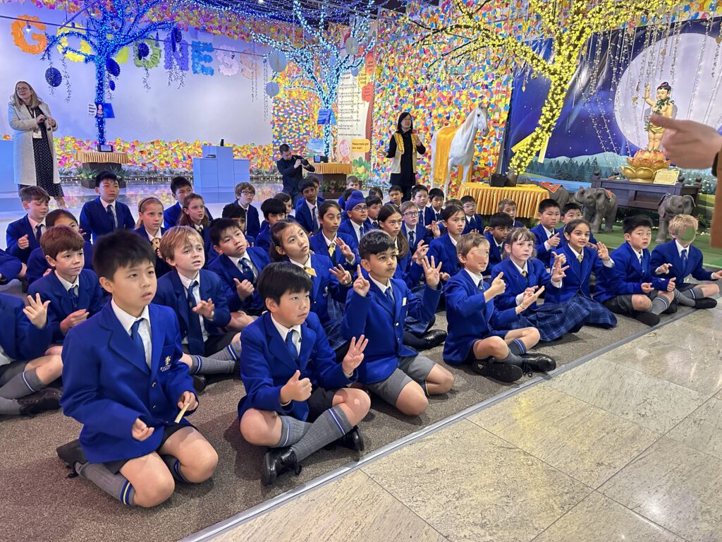 A group of school children in blue blazers