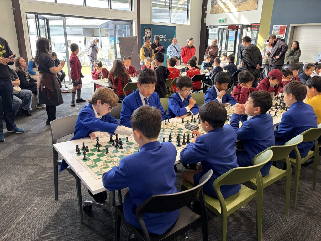 A group of schoolboys playing chess